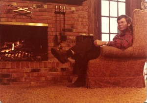 Happy days - my husband, Don, by the fire at our house.